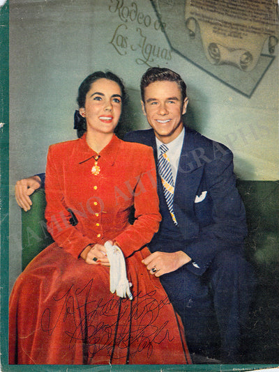Taylor, Elizabeth - Signed Photograph with Conrad Hilton Jr.
