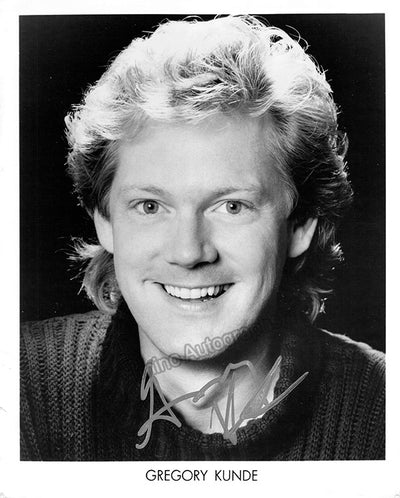 KUNDE, Gregory