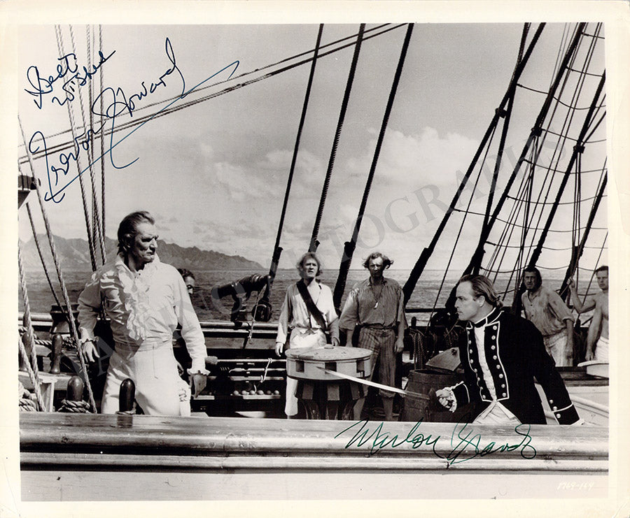 Brando, Marlon - Howard, Trevor - Double Signed Photograph in "Mutiny on the Bounty"