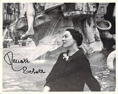 As herself near waterfall