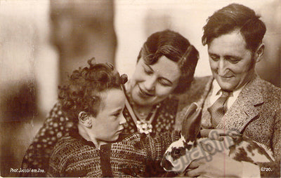 As herself with family