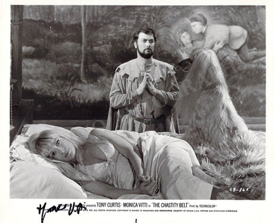 Vitti, Monica - Signed Photograph in "The Chastity Belt"